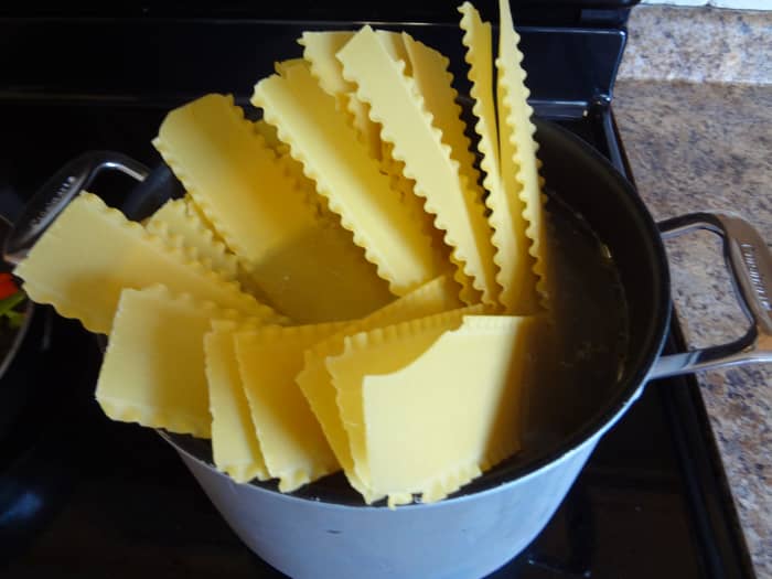 Try to spread out the noodles when you put them in the pot so that they won't stick together as much.