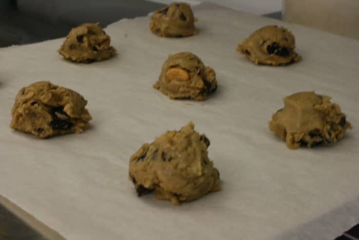 Place rounded tablespoon-fulls of dough on the cookie sheet.