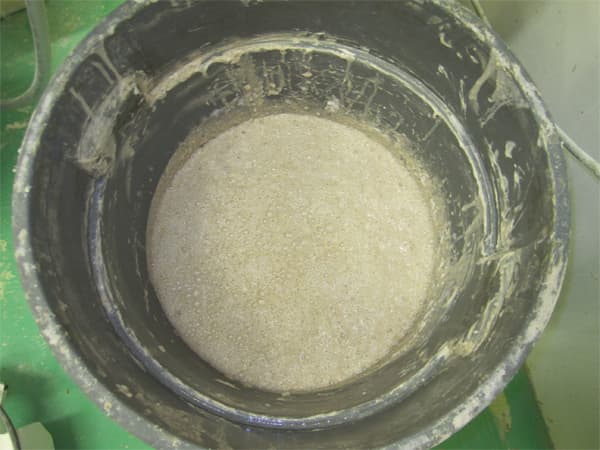 Leaven ready for mixing. Note all the bubbles on the surface. 