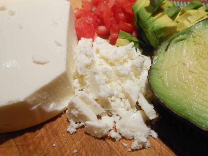Queso fresco, tomato and avocado are common ingredients found in chalupas. They also keep the flavors light and fresh.