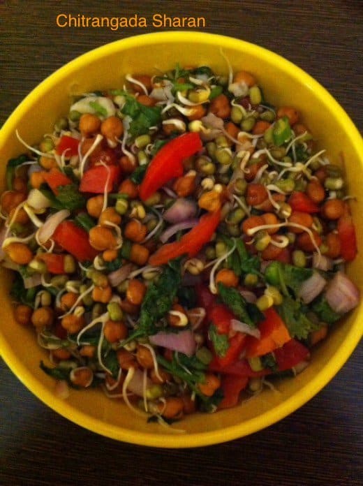 Delicious green gram, black gram snack recipe (moong, chana sprouts chaat). Add chopped onion, tomatoes, green coriander and lime juice to make it yummy and nutritious.
