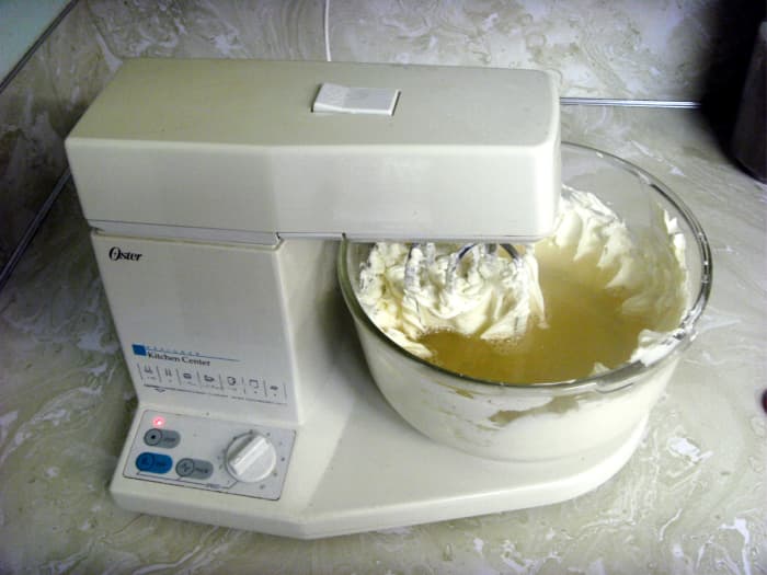 Mix the gelatin mixture with the cream cheese. Start with the mixer on slow so that the water isn't thrown out.