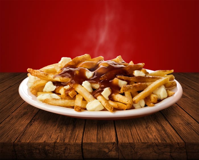 This is a promo photo of Wendy's poutine. "The delicious marriage of flavours melts together to create a truly Canadian favourite."