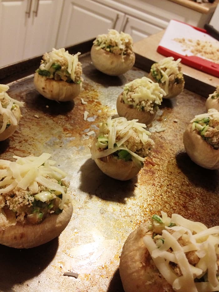 -- All Rights Reserved -- Do Not Distribute -- Spinach and Cheese Stuffed Mushroom Caps Before and After Parmesan Crumbs with Mozzarella Topping -- All Rights Reserved -- Do Not Distribute -- Spinach and Cheese Stuffed Mushroom Caps - Ready to go in!