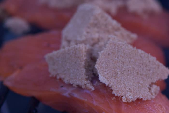I love the Yukon Candy Salmon at Whole Foods. It is a very sweet smoked salmon. I added some brown sugar to the BGE in the hopes that it would slowly melt into the salmon pieces. It did quite wonderfully!