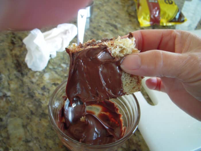 Spread melted chips over top half and sides of each quarter. You don't have to cover the bottom of the sandwich.
