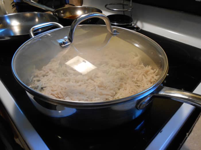 Cook hash browns covered for 8 minutes on medium heat. Uncover and flip hash browns. Cook uncovered for 6 more minutes.
