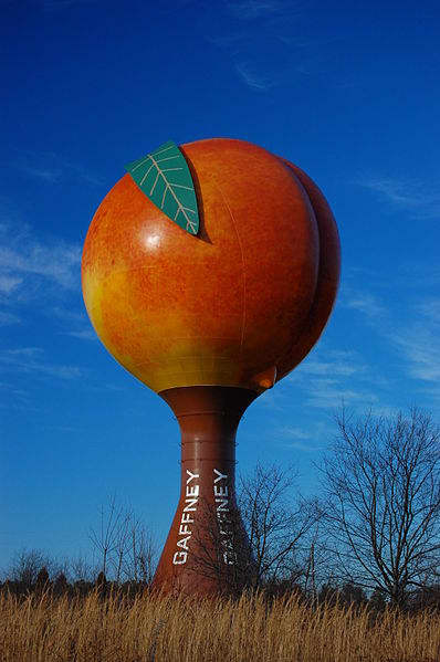 The Peachoid in Gaffney, South Carolina is a giant water tank in the shape of a peach. It is a novelty roadside attraction off Interstate 85.