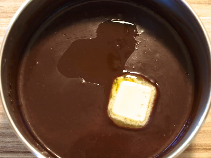 Step 4: Remove from heat and add flavoring and butter to the warm sauce. Mix thoroughly.