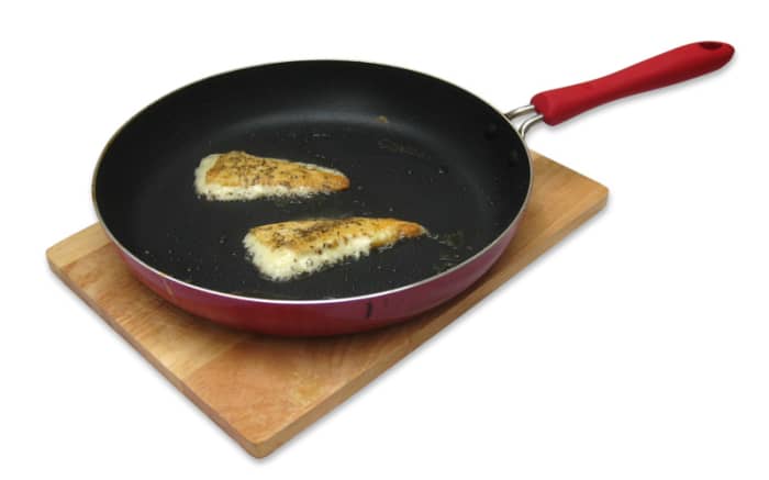 Frying the saganaki. In this case, there is too much olive oil in the frypan. There should only be a smear of oil, otherwise the cheese melts quicker and you have less chance of getting that crispy golden skin.