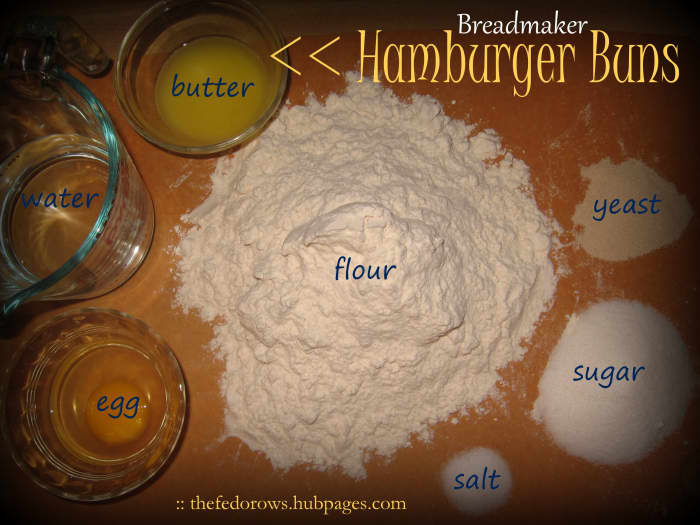 To make breadmaker buns you'll need melted butter, water, egg, flour, salt, sugar, and yeast.