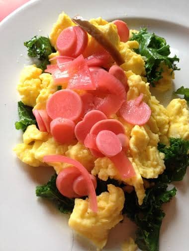 Canned pickled radishes topping scrambled eggs and kale. What a great, healthy breakfast!