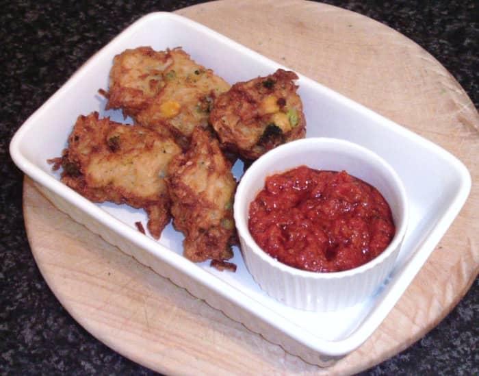Tasty and crunchy broccoli, sweetcorn and potato fritters with an authentic, homemade pizza sauce dip