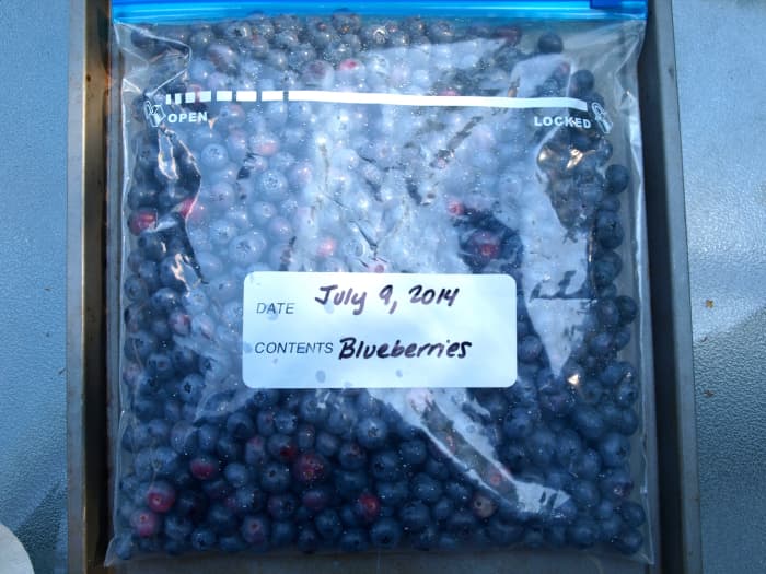 Once the berries are frozen, transfer them to a freezer bag and label. Place in the freezer until ready to use.