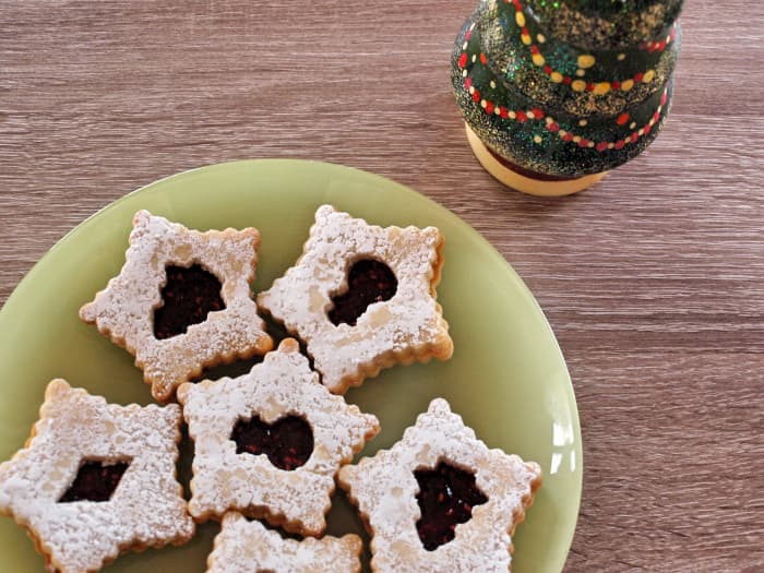 Filled with raspberry jam, delicious Linzer cookies are a fancy addition to a cookie tray, and they always wow your friends and family.