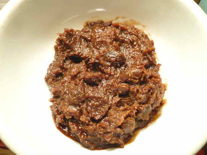 Doenjang does rather resemble something you might find in a field full of cattle.