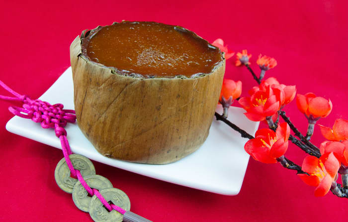 Chinese New Year nian gao, a type of sweetened festive rice cake. Note that this is the raw form. It has to be steamed or fried before being served.