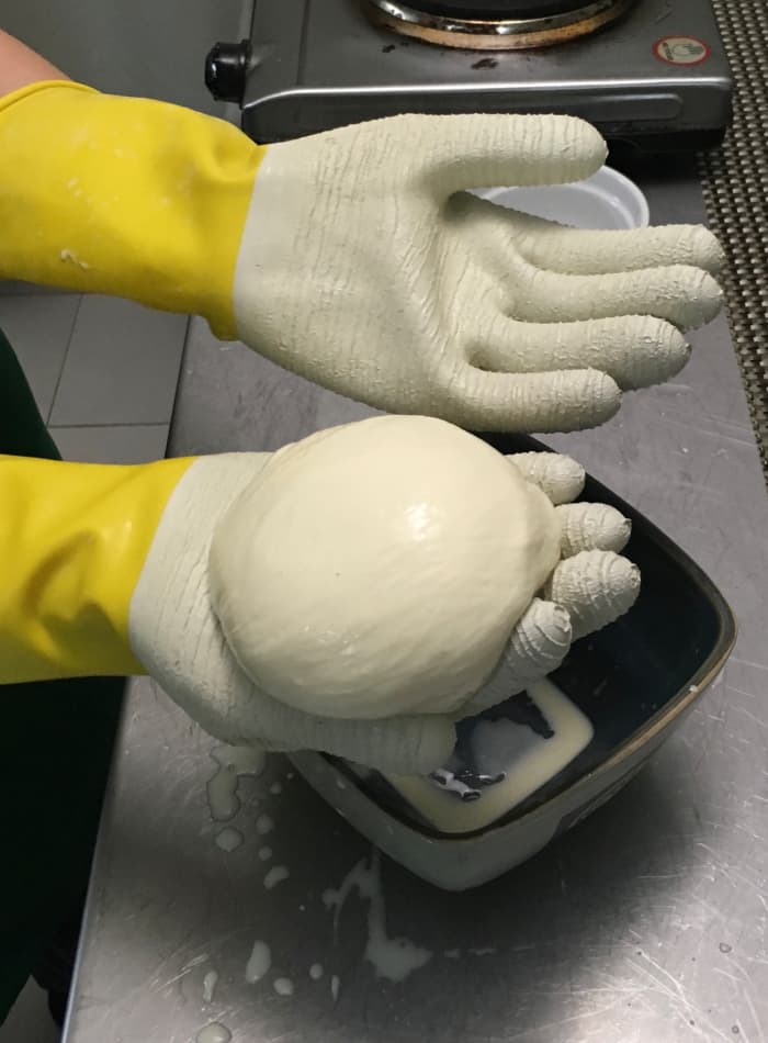Heat the cheese another 30-60 seconds and stretch, until cheese can be formed into a ball.