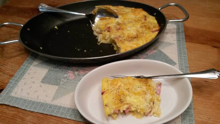 Breakfast bacon casserole being served.