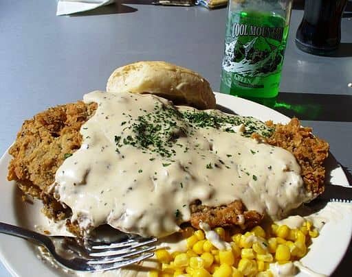 Fried chicken smothered in thick gravy—butter and flour are the start of something wonderful.