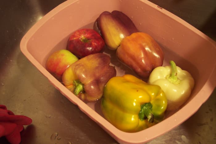 Whether rinsed under a faucet or soaked in a basin, gently rub the produce to ensure getting dirt and pesticide resides off.