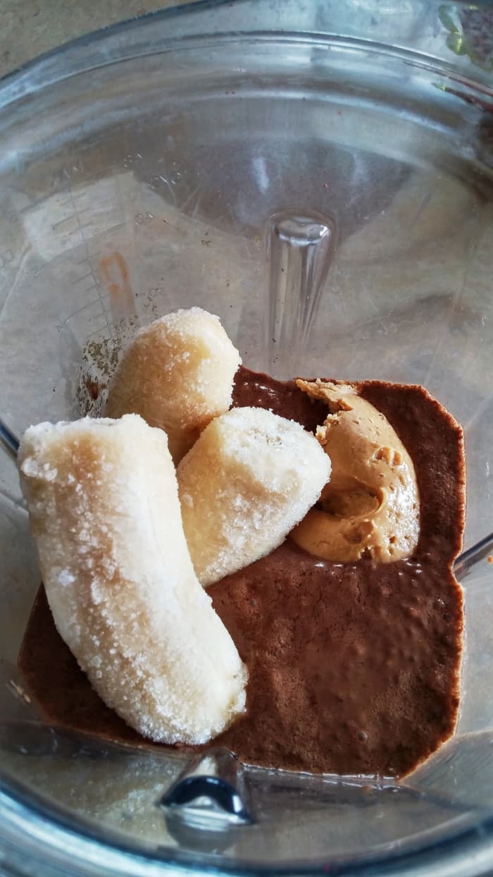 Step 2: Mix in the frozen bananas and the peanut butter with the chia base. These ingredients add the sweet and creamy component.