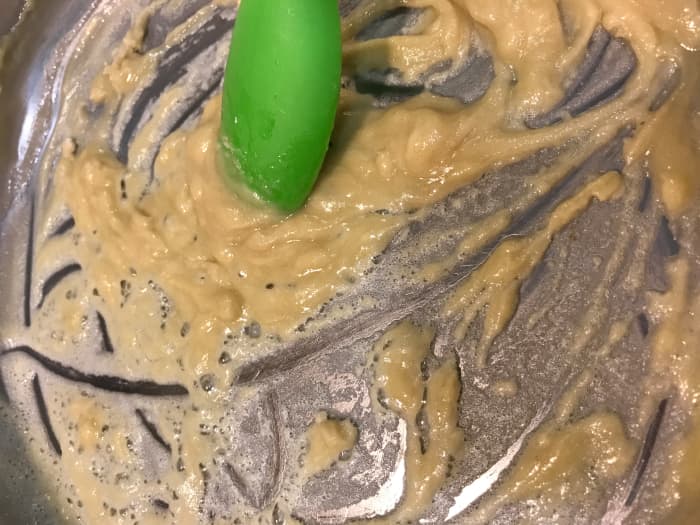 A roux - which thickens the sauce - is really just three ingredients. Start by melting the butter, and stirring the flour in until it thickens. Cook about a minute - just enough to get rid of the 'raw flour' taste.