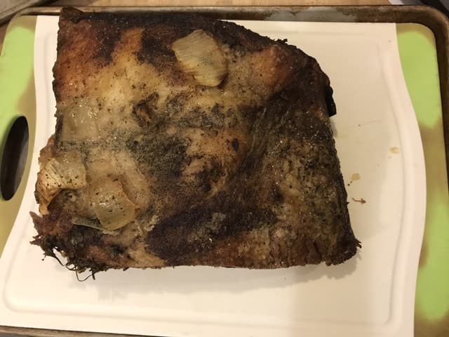 Place the roast on a cutting board and just let it rest while you finish the au jus. Don't cut it yet!