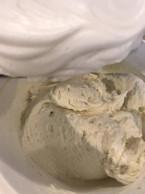 Now it's time to fold the egg whites into the batter. Do this by hand with an 'over and under' motion. It shows in the video. Be careful at this stage - you don't want to deflate your egg whites.
