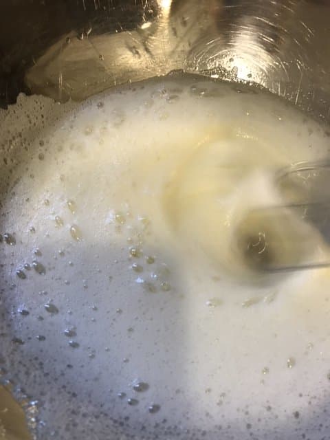 The eggs will first appear foamy - this is exactly what you want. This step isn't hard (unless you're whipping by hand!), but it does take a little patience. Just keep at it.
