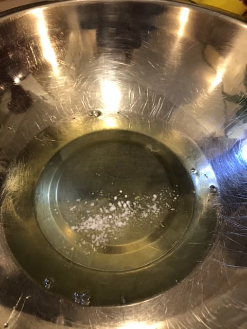 A little cream of tartar helps the egg whites reach full volume, which also helps give the cake its structure. A perfectly clean bowl and whisks is also necessary, since the whites won't whip if there's any fat in the bowl.