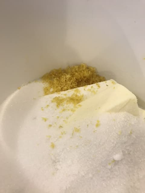 This cake uses the creaming method - beating together butter and sugar until they are light and fluffy. The lemon zest is added at the beginning, insuring it's evenly distributed for best flavor.