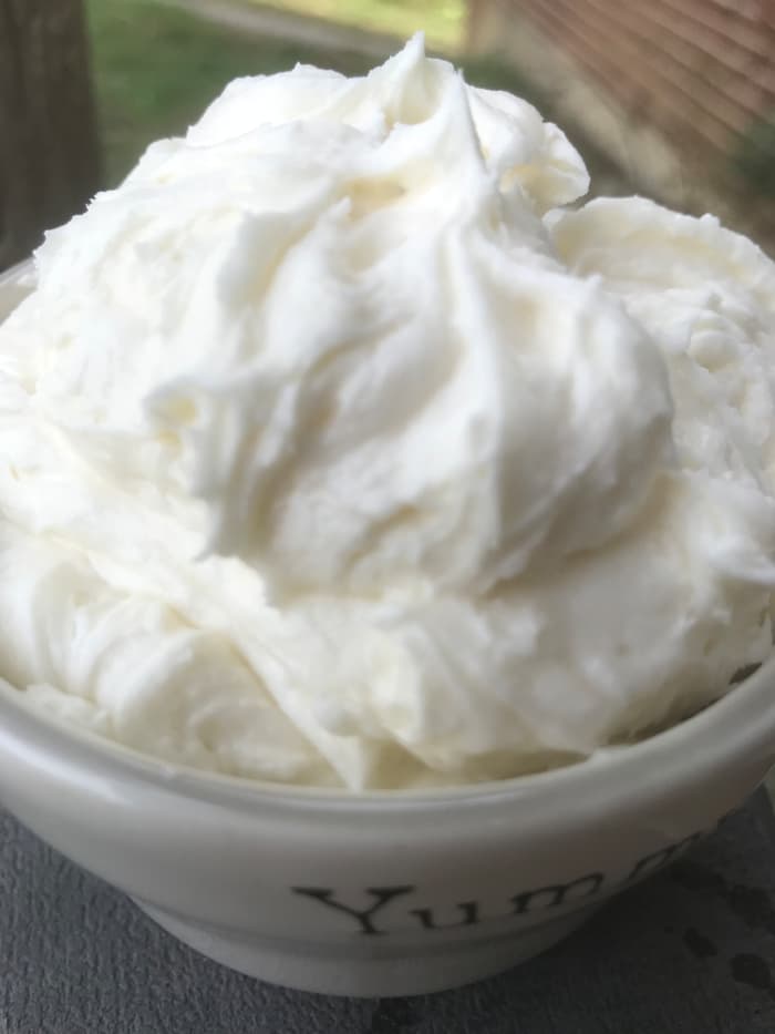 Homemade buttercream frosting ready to use - this stuff is fabulous! Perfect for almost any cake or cupcake, knowing how to make buttercream frosting will give you super powers in the kitchen!