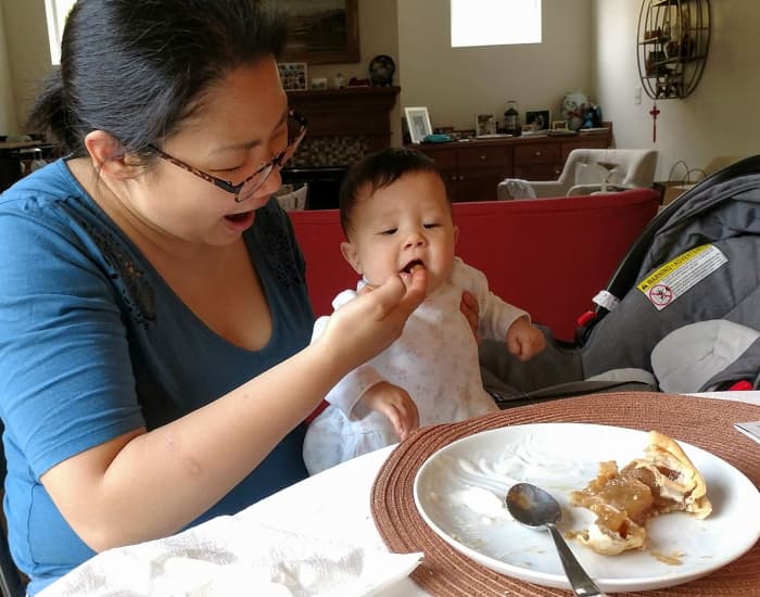 Grandbaby Anna's first taste of my farmhouse apple slab pie with Chinese Sugar. She loved it!