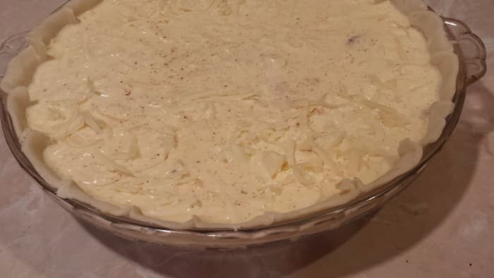Ensure that filling and egg is evenly distributed, then bake until crust is golden and center is set!