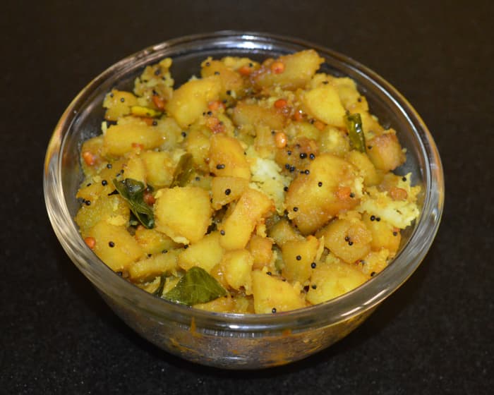 Transfer it to a serving dish. Eat 3-4 tablespoons of this snack whenever you desire or serve it as a side dish for the meal. Enjoy the taste!