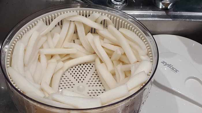 The easiest way to dry rinsed radishes is to use a salad spinner.