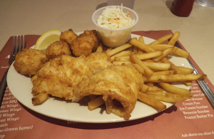In New England in the summer, it's hard to resist a bowl of creamy clam chowder, followed by fried clams or fried haddock. Ask if they have broiled seafood on the menu. You can also split some fried seafood with a friend to minimize the damage.