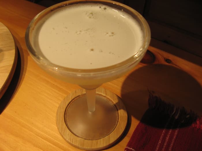 A glass of white wine would have been a better choice than this sugary margarita. If it's lunch time, I usually opt now for water with a lemon wedge. It's the evening meal that tempts me to order a fancier beverage.