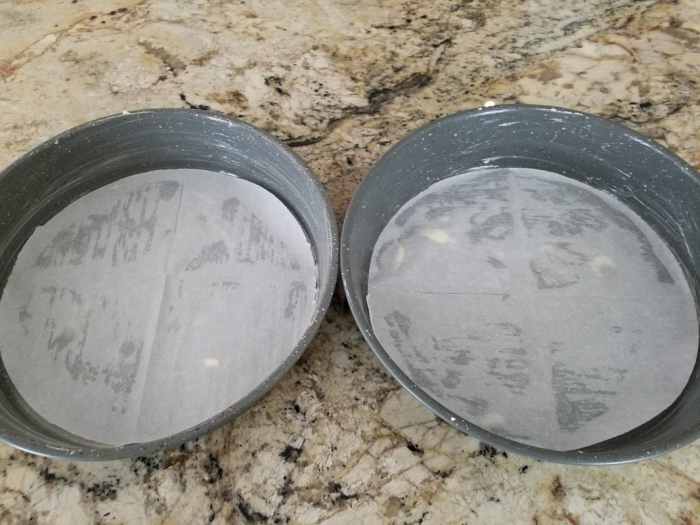I cut out a sheet of parchment to fit the bottom of the pan and grease it with my butter alternative just before placing the parchment on the pan. Make sure to grease the sides, too.