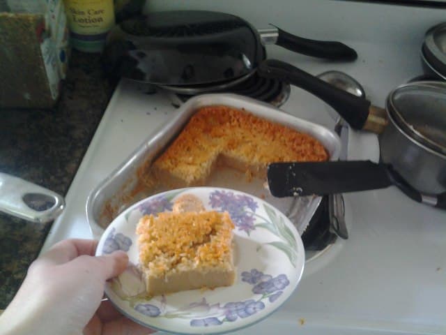 The coconut on the surface of the cake should be golden if you decide to sprinkle it on top prior to baking.