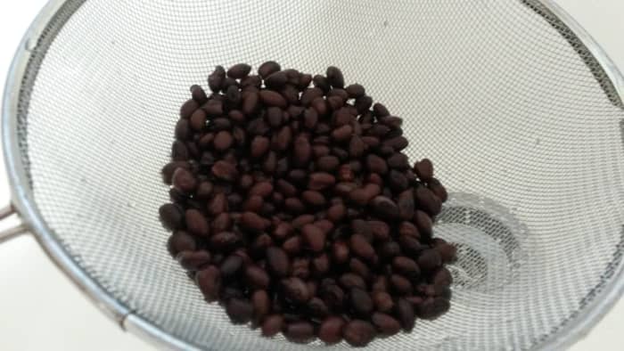 Rinse canned black beans before adding to skillet. Black beans are a major ingredient in this recipe.