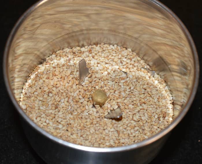 Step two: Once completely cold, put them into a mixer jar. Grind to get a smooth powder. Scrape the sides often while grinding. This will help to get a smooth powder.