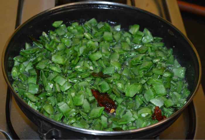Step five: After some time, the water evaporates completely and the veggies get cooked. Add remaining salt. Mix well. Turn off the heat.