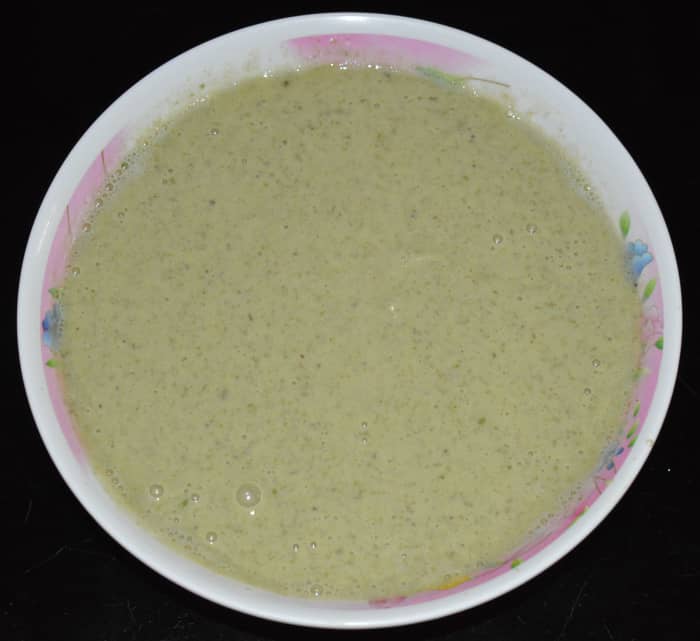 Step three: Transfer the batter to a bowl. Add water to adjust the consistency. Set aside for 2 to 3 hours. This will help to make naturally soft pancakes. There's no need to ferment the batter.