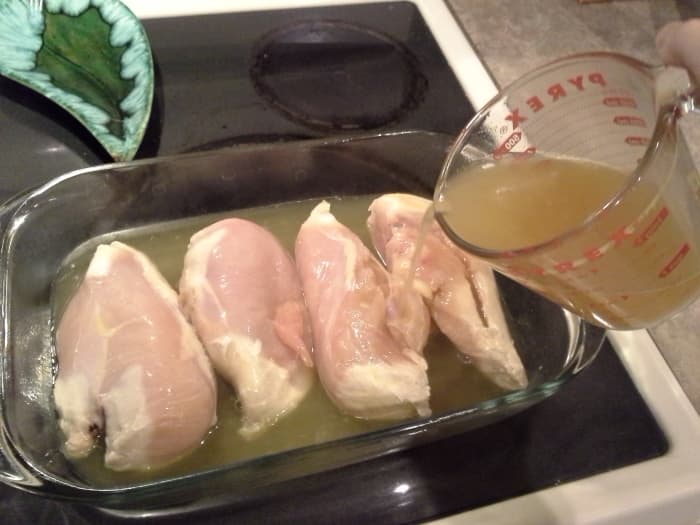 Step Three: Place your chicken breasts in your casserole dish and top with your chicken broth