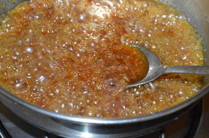 Step six: Add remaining grated coconut, cardamom powder, and 2 pinches of salt. Stir the mixture until the mixture becomes thicker.
