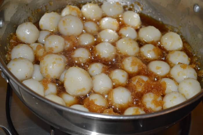 Step seven: Add steam-cooked rice balls. Gently mix them with the jaggery-coconut mixture. Softly stir the mix until you get a semi-solid consistency. Turn off the heat.