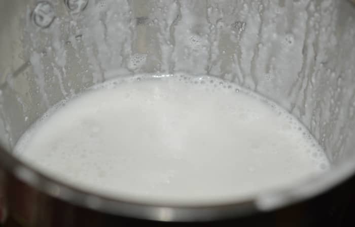 The rice-coconut paste will look like this. Add salt as per instructions. Thin the batter by adding some water.