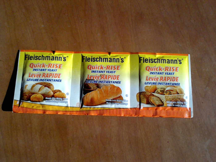 Shown here are 3 small packages of yeast, each containing 8 grams (2 teaspoons). One package is needed per loaf.